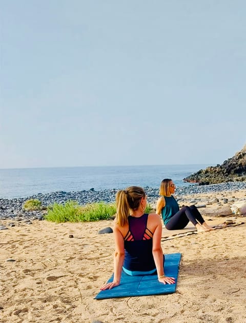 Yoga aan het strand