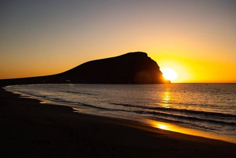Zonsondergang aan het strand